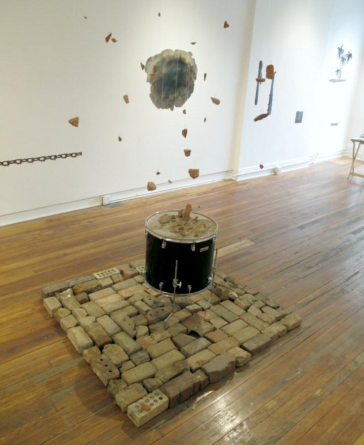 A sane revolution, bricks, drum, fish wire, copper thread, 144" x 53" x 53"