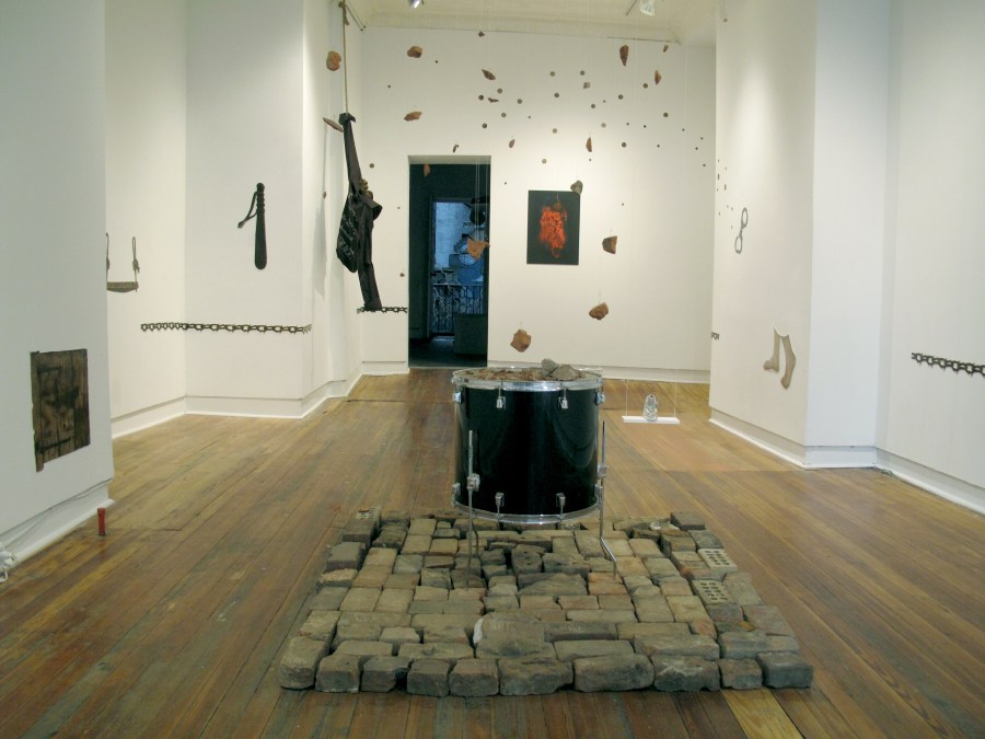 A sane revolution, bricks, drum, fish wire, copper thread, 144" x 53" x 53"