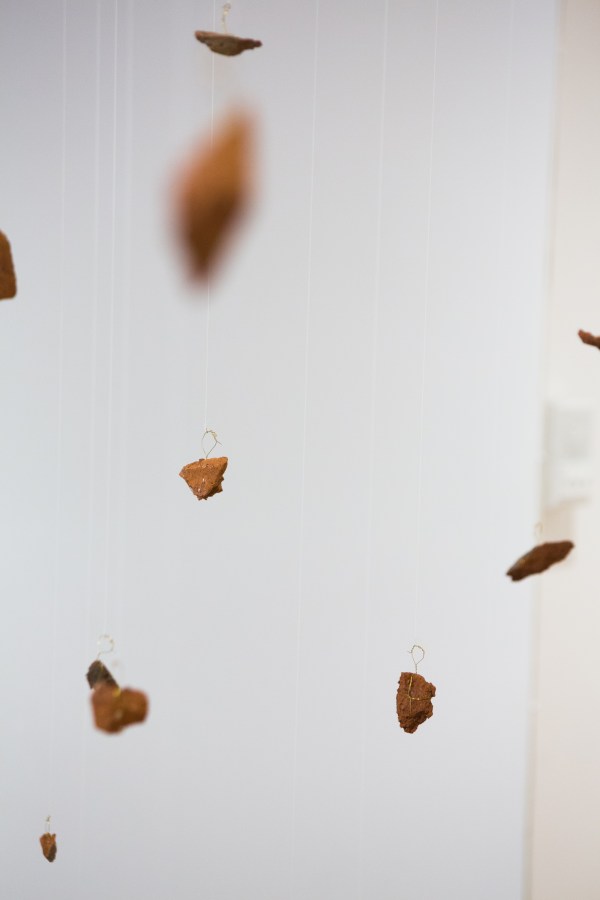 Detail A sane revolution, bricks, drum, fish wire, copper thread, 144" x 53" x 53"